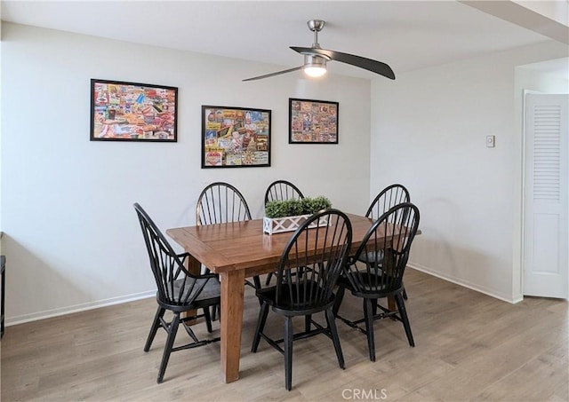 3311 Via Carrizo Unit P, Laguna Woods, CA 92637 - dining area with light wood-style flooring, a ceiling fan, and baseboards