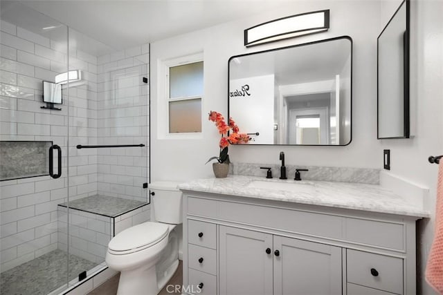 3311 Via Carrizo Unit P, Laguna Woods, CA 92637 - full bathroom featuring vanity, a shower stall, and a baseboard radiator