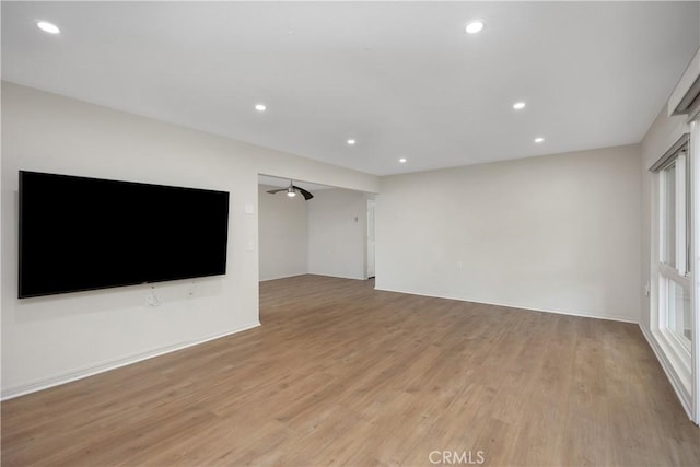 3311 Via Carrizo Unit P, Laguna Woods, CA 92637 - unfurnished living room with a ceiling fan, light wood-style floors, and recessed lighting