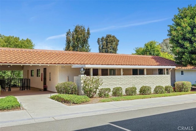 3311 Via Carrizo Unit P, Laguna Woods, CA 92637 - view of front facade featuring stucco siding and a tile roof