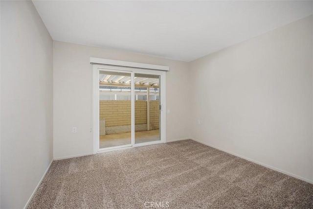 3311 Via Carrizo Unit P, Laguna Woods, CA 92637 - carpeted spare room featuring baseboards