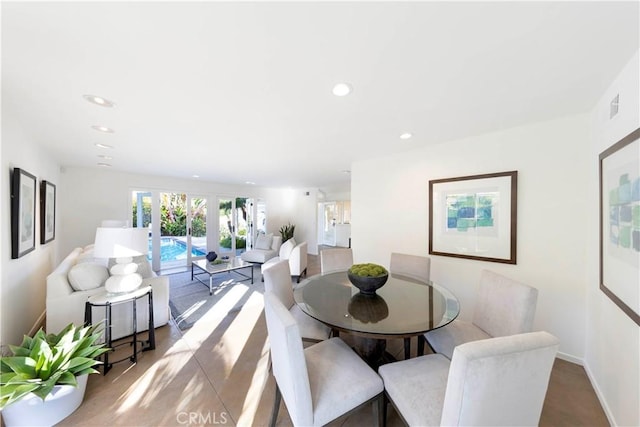 dining area featuring baseboards, french doors, visible vents, and recessed lighting