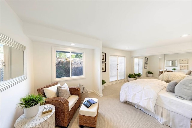 bedroom with recessed lighting, access to outside, baseboards, and light colored carpet