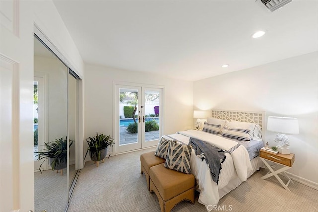 bedroom featuring visible vents, light colored carpet, access to exterior, french doors, and recessed lighting