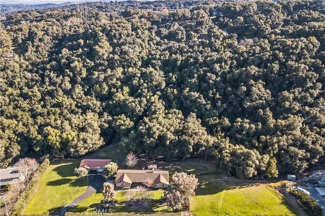 bird's eye view featuring a view of trees