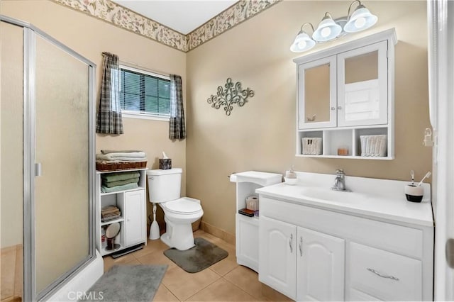 full bathroom featuring vanity, tile patterned flooring, a shower stall, and toilet