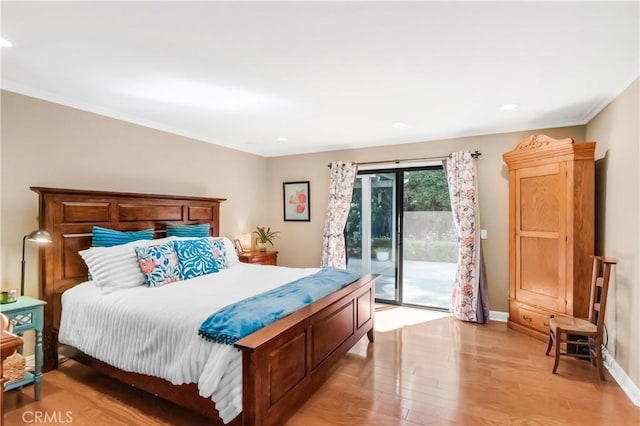 bedroom with access to outside, recessed lighting, light wood-style flooring, and baseboards