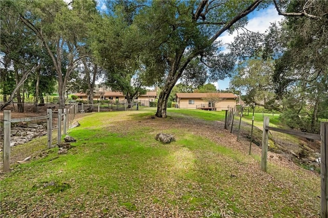 view of yard with fence