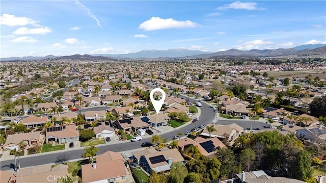 bird's eye view with a residential view and a mountain view