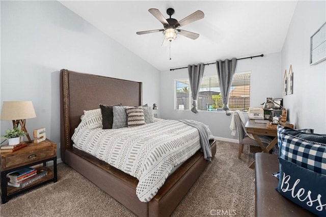 bedroom featuring a ceiling fan, lofted ceiling, baseboards, and carpet