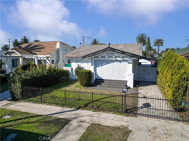 bungalow-style house featuring entry steps, a front lawn, and a fenced front yard