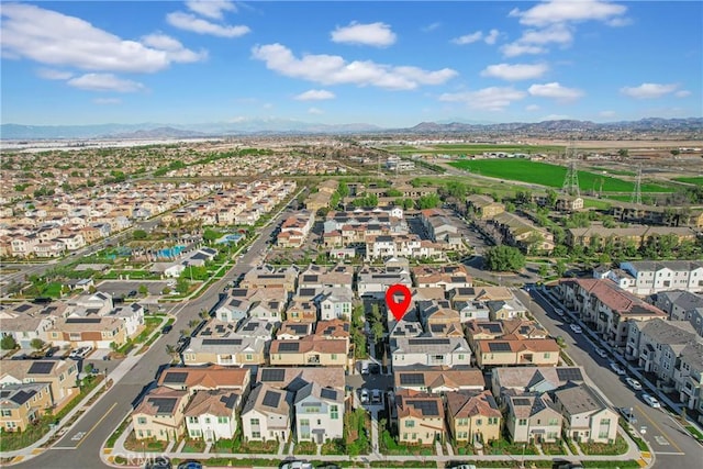 birds eye view of property with a residential view and a mountain view