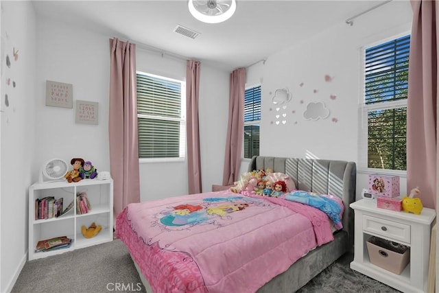 bedroom featuring carpet and visible vents