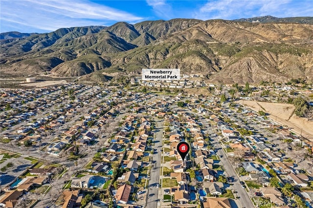 drone / aerial view with a residential view and a mountain view