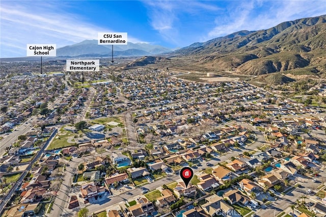 aerial view with a residential view and a mountain view