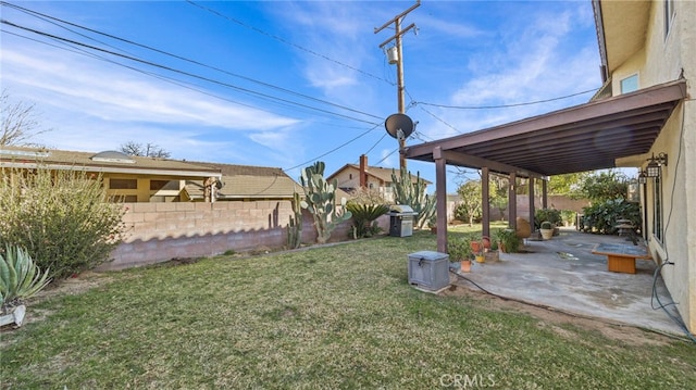 view of yard with a patio area and fence