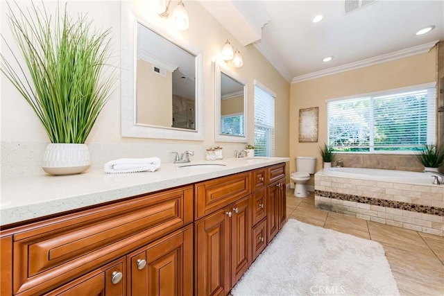 bathroom featuring toilet, a sink, a bath, tile patterned floors, and crown molding