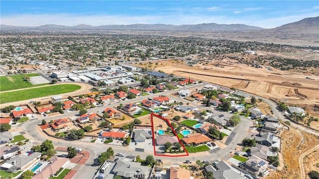 bird's eye view with a residential view and a mountain view