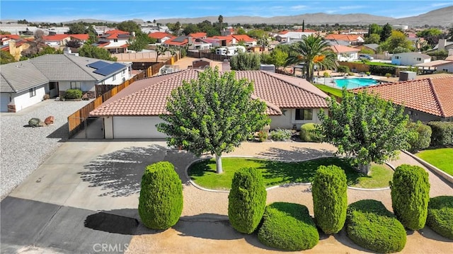 aerial view with a residential view and a mountain view