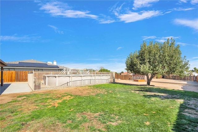 view of yard with a patio area and a fenced backyard