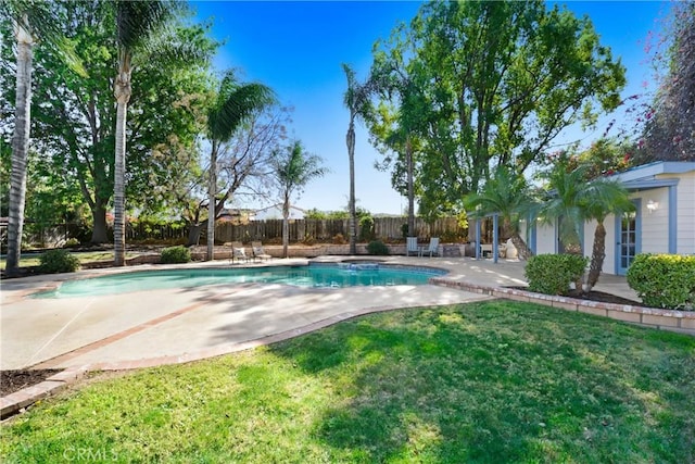 view of pool featuring a yard, a fenced backyard, a fenced in pool, and a patio