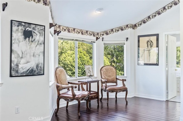 13440 Pala Ave, Sylmar, CA 91342 - living area with baseboards and dark wood-style flooring