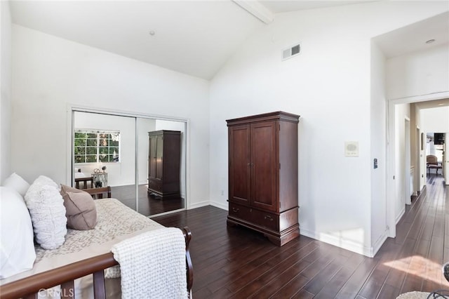 13440 Pala Ave, Sylmar, CA 91342 - bedroom with beam ceiling, dark wood-type flooring, high vaulted ceiling, baseboards, and a closet