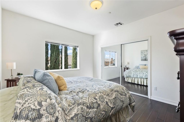 13440 Pala Ave, Sylmar, CA 91342 - bedroom with dark wood finished floors, baseboards, and a closet