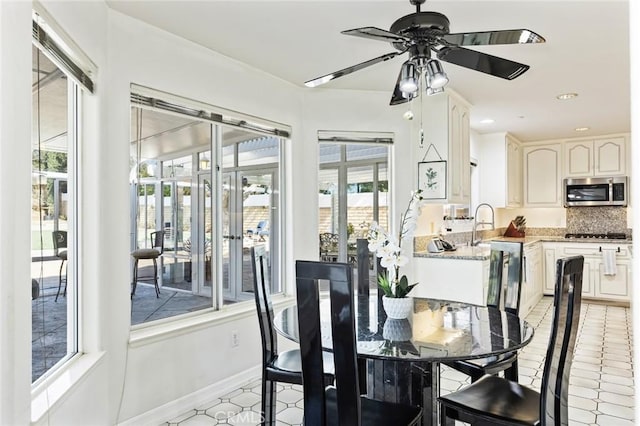 13440 Pala Ave, Sylmar, CA 91342 - dining space with ceiling fan, baseboards, and recessed lighting