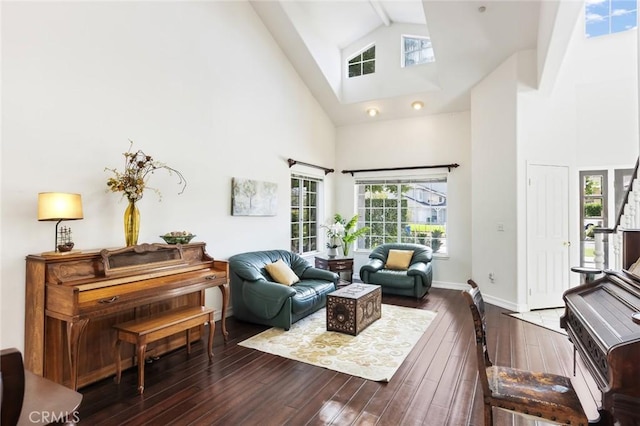 13440 Pala Ave, Sylmar, CA 91342 - living area featuring high vaulted ceiling, dark wood finished floors, baseboards, and beam ceiling
