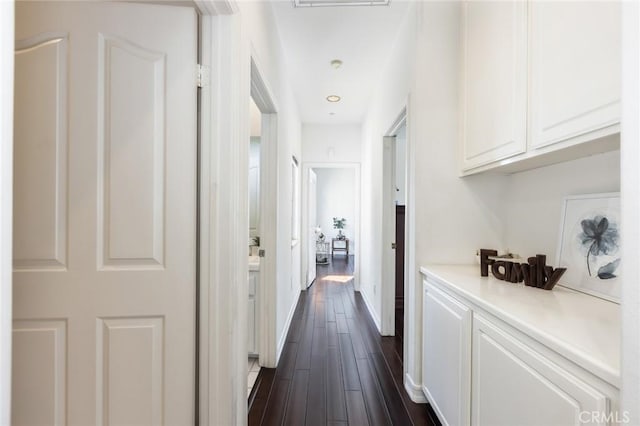 13440 Pala Ave, Sylmar, CA 91342 - hall featuring dark wood finished floors and baseboards