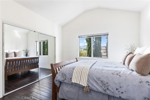 13440 Pala Ave, Sylmar, CA 91342 - bedroom featuring a closet, vaulted ceiling, and wood finished floors