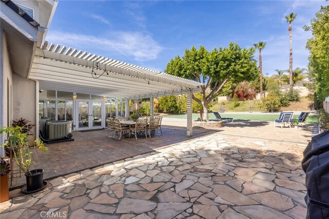 13440 Pala Ave, Sylmar, CA 91342 - view of patio / terrace featuring french doors, a pergola, outdoor dining space, and central AC unit
