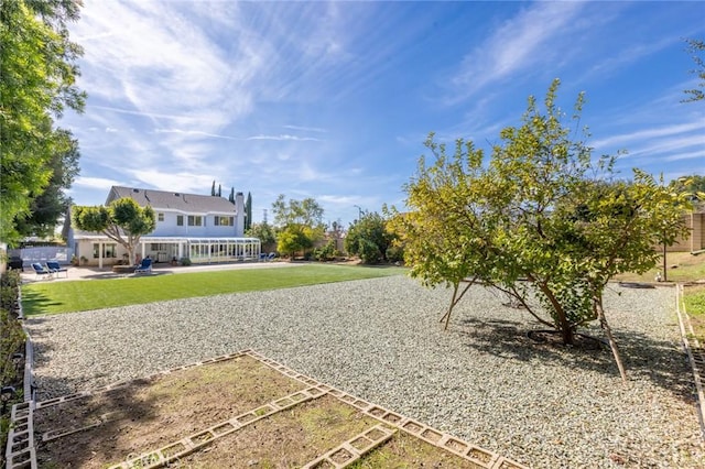 13440 Pala Ave, Sylmar, CA 91342 - view of green lawn featuring a patio