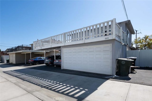 view of home's exterior with a garage and stucco siding