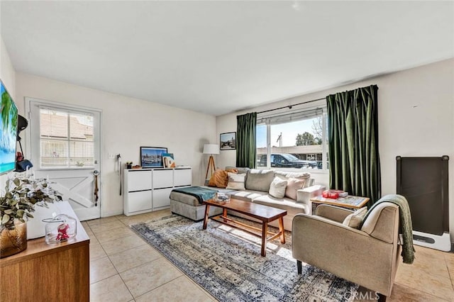 living area with light tile patterned flooring