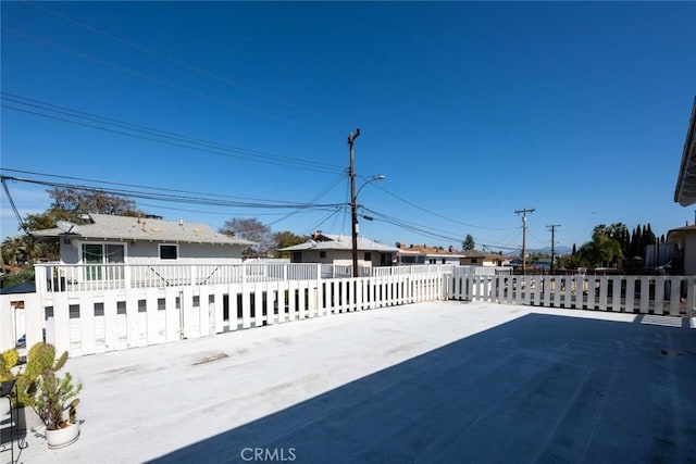 view of patio / terrace featuring fence