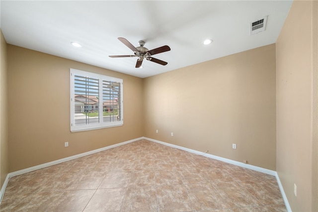 spare room with baseboards, visible vents, ceiling fan, and recessed lighting