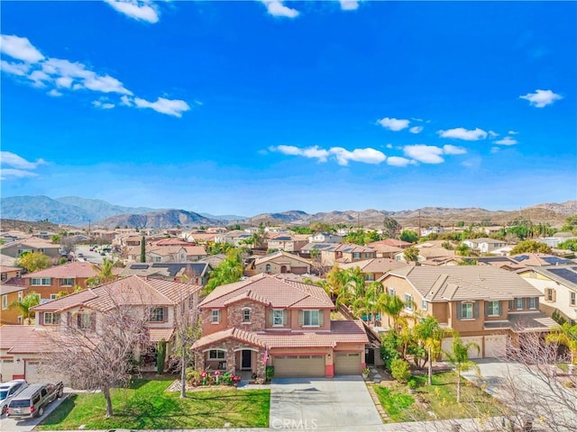 birds eye view of property featuring a residential view and a mountain view