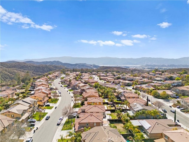 birds eye view of property with a residential view and a mountain view