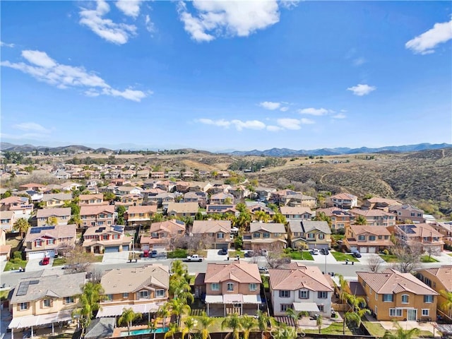 birds eye view of property with a residential view and a mountain view