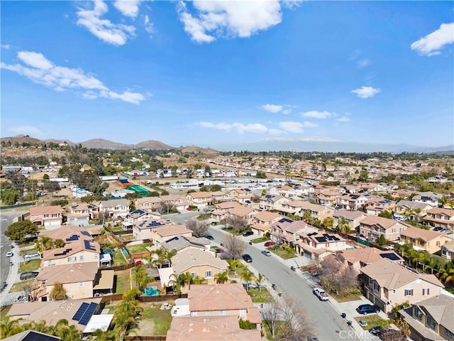 birds eye view of property with a residential view and a mountain view