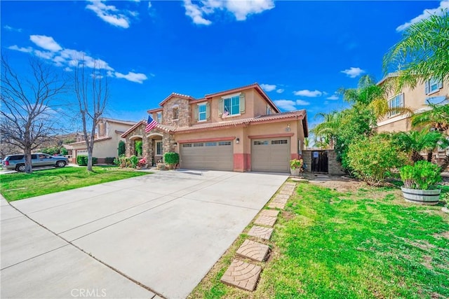 view of front of property with a tile roof, stucco siding, an attached garage, driveway, and a front lawn