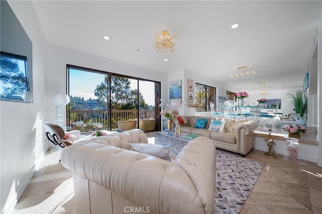 living area with recessed lighting and baseboards