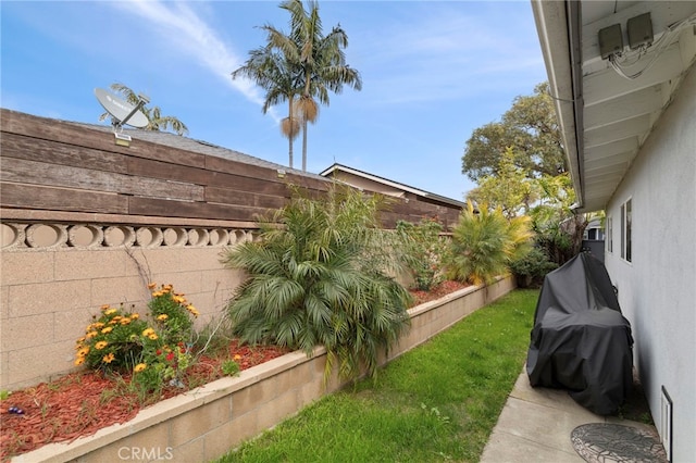 view of yard featuring fence