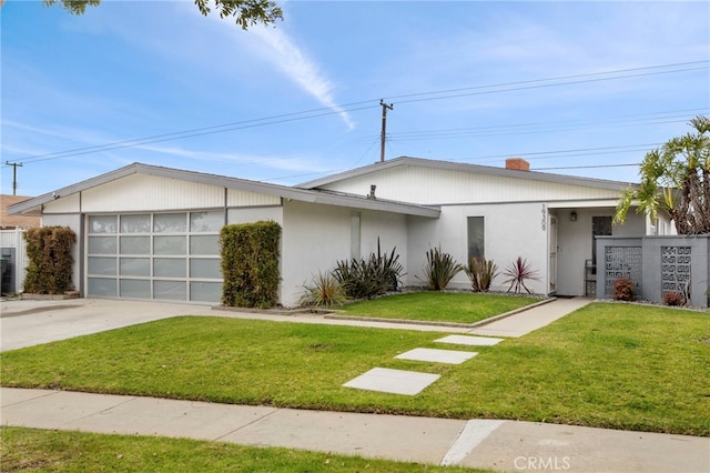 19309 Tillman Ave, Carson, CA 90746 - mid-century inspired home with a garage, concrete driveway, a front lawn, and a chimney