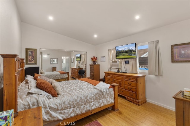 bedroom with lofted ceiling, light wood-style floors, baseboards, and recessed lighting