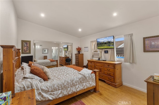 19309 Tillman Ave, Carson, CA 90746 - bedroom with light wood-style flooring, lofted ceiling, and recessed lighting