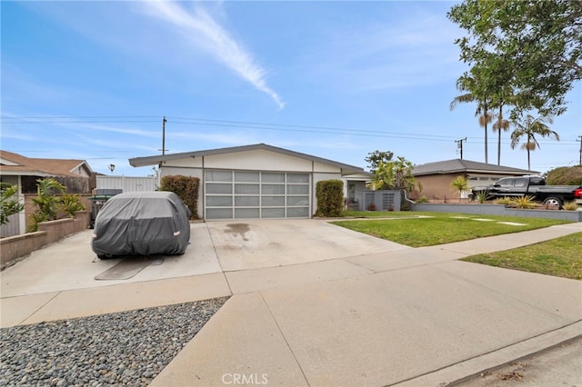 19309 Tillman Ave, Carson, CA 90746 - view of front facade with driveway and an attached garage