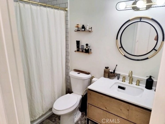 full bathroom featuring curtained shower, vanity, and toilet